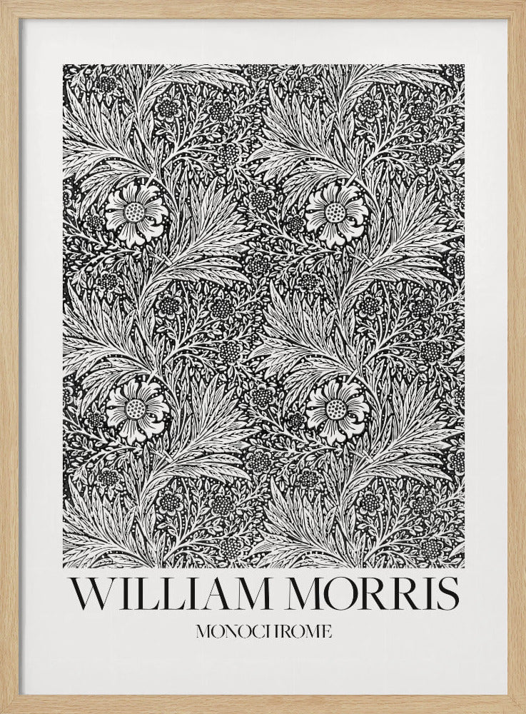 A framed art print featuring a classic William Morris pattern in monochrome. The intricate black and white design is filled with dense, swirling foliage and stylized flowers. The artwork has a white border, and at the bottom, the text 'WILLIAM MORRIS' is displayed prominently, with 'MONOCHROME' written underneath in a smaller font. Artwork