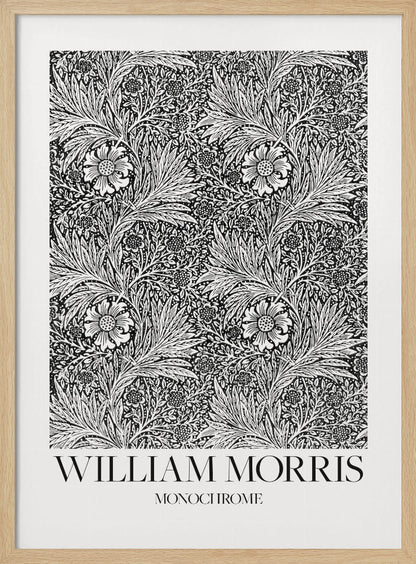 A framed art print featuring a classic William Morris pattern in monochrome. The intricate black and white design is filled with dense, swirling foliage and stylized flowers. The artwork has a white border, and at the bottom, the text 'WILLIAM MORRIS' is displayed prominently, with 'MONOCHROME' written underneath in a smaller font. Artwork
