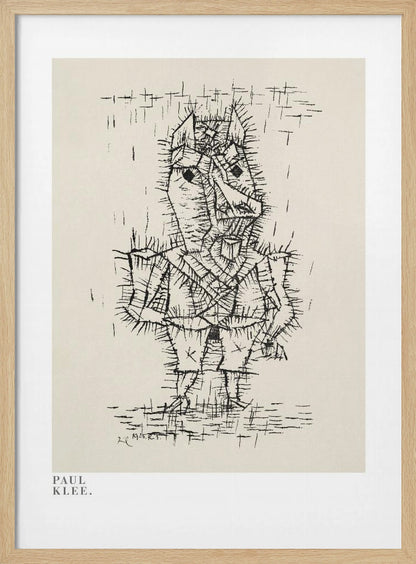 A framed art print of a Paul Klee drawing. The artwork features a stylized, abstract figure composed of short, spiky black ink lines on a light cream background, giving it a prickly texture. The figure stands against a sparse background with simple lines. The print is in a black frame, and the text 'PAUL KLEE.' is visible in the lower-left corner. Decor