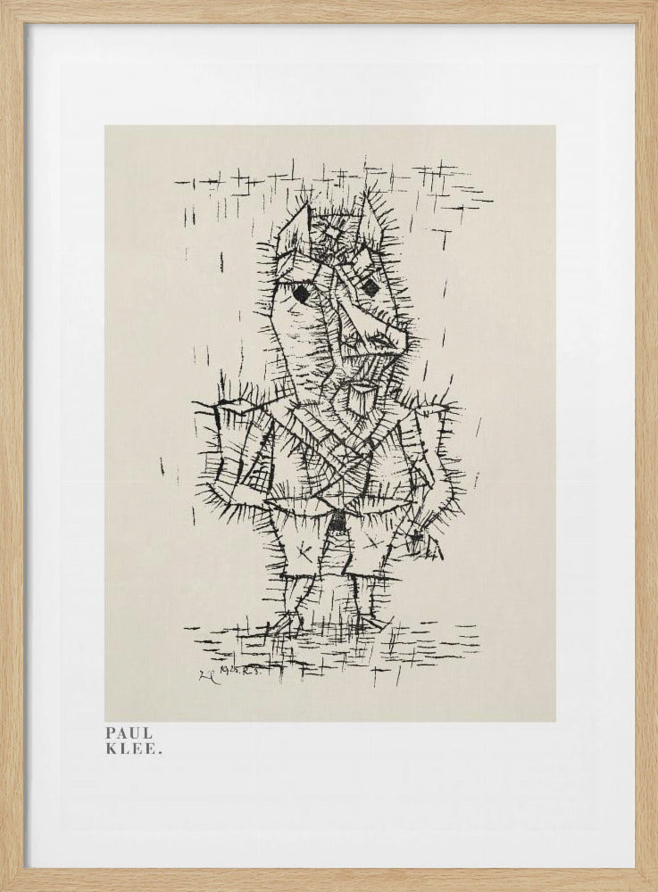 A framed art print of a Paul Klee drawing. The artwork features a stylized, abstract figure composed of short, spiky black ink lines on a light cream background, giving it a prickly texture. The figure stands against a sparse background with simple lines. The print is in a black frame, and the text 'PAUL KLEE.' is visible in the lower-left corner. Decor