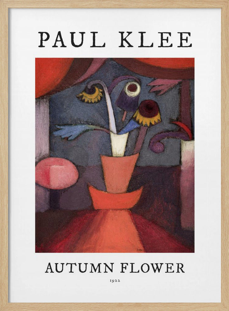 A poster of Paul Klee's 1922 painting 'Autumn Flower'. The abstract artwork features a stylized vase with surreal flowers in shades of red, orange, blue, and purple. The poster has a white border with 'PAUL KLEE' at the top and 'AUTUMN FLOWER 1922' at the bottom, all within a thin black frame. Poster