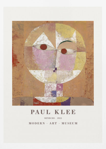 A framed museum poster of Paul Klee's 1922 painting 'Senecio'. The artwork is an abstract, geometric portrait of a human head in warm tones of orange, yellow, pink, and red against a textured brown background. The text 'PAUL KLEE', 'SENECIO - 1922', and 'MODERN - ART - MUSEUM' is printed below the image. Print