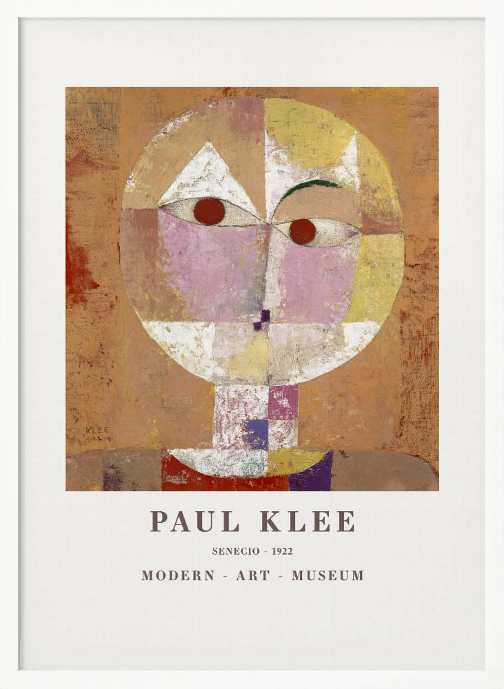 A framed museum poster of Paul Klee's 1922 painting 'Senecio'. The artwork is an abstract, geometric portrait of a human head in warm tones of orange, yellow, pink, and red against a textured brown background. The text 'PAUL KLEE', 'SENECIO - 1922', and 'MODERN - ART - MUSEUM' is printed below the image. Print