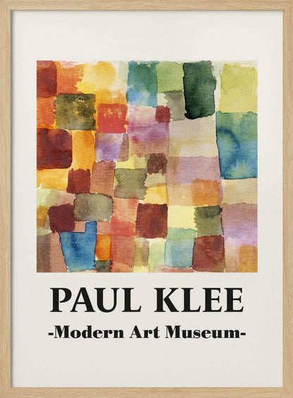 A framed museum poster for a Paul Klee exhibition at the Modern Art Museum. The poster features an abstract watercolor painting composed of a grid of colorful, overlapping squares and rectangles in shades of red, orange, yellow, green, and blue. Decor