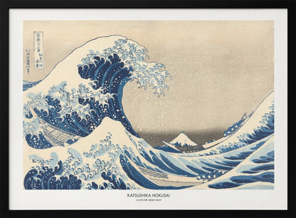 A framed print of Katsushika Hokusai's famous woodblock artwork, 'The Great Wave off Kanagawa,' featuring a giant, turbulent blue wave with white foam cresting over small boats, with Mount Fuji visible in the background under a muted sky. Wall Art