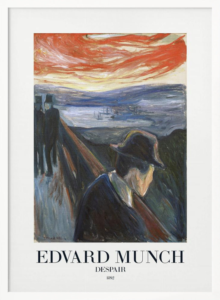 A framed art print of Edvard Munch's 1892 painting, 'Despair'. The expressionist artwork depicts a man in a dark coat and hat leaning over a bridge railing in profile, with a fiery red and orange sunset in the background. Below the image, text reads 'EDVARD MUNCH DESPAIR 1892'. Print