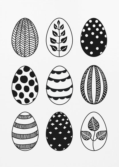 A black and white art print featuring a 3x3 grid of nine illustrated Easter eggs. Each egg has a unique, hand-drawn pattern, including polka dots, stripes, chevrons, florals, and leafy branches, all within a thin black frame. Poster