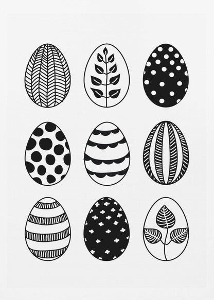 A black and white art print featuring a 3x3 grid of nine illustrated Easter eggs. Each egg has a unique, hand-drawn pattern, including polka dots, stripes, chevrons, florals, and leafy branches, all within a thin black frame. Poster