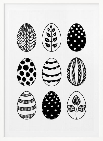 A black and white art print featuring a 3x3 grid of nine illustrated Easter eggs. Each egg has a unique, hand-drawn pattern, including polka dots, stripes, chevrons, florals, and leafy branches, all within a thin black frame. Poster