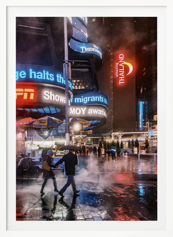 A couple walks hand-in-hand under an umbrella on a rainy night in a bustling city square. Steam rises from the wet pavement, which reflects the vibrant blue, red, and white lights from massive digital billboards on the surrounding buildings. Wall Art