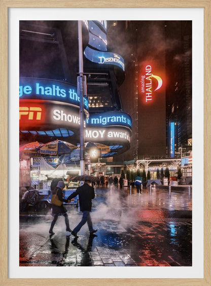 A couple walks hand-in-hand under an umbrella on a rainy night in a bustling city square. Steam rises from the wet pavement, which reflects the vibrant blue, red, and white lights from massive digital billboards on the surrounding buildings. Wall Art