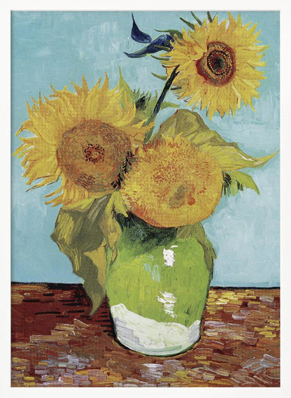 A framed reproduction of Vincent van Gogh's famous 'Sunflowers' painting, featuring three large yellow sunflowers in a green vase against a light blue background, painted in his iconic post-impressionist style with thick brushstrokes. Wall Art