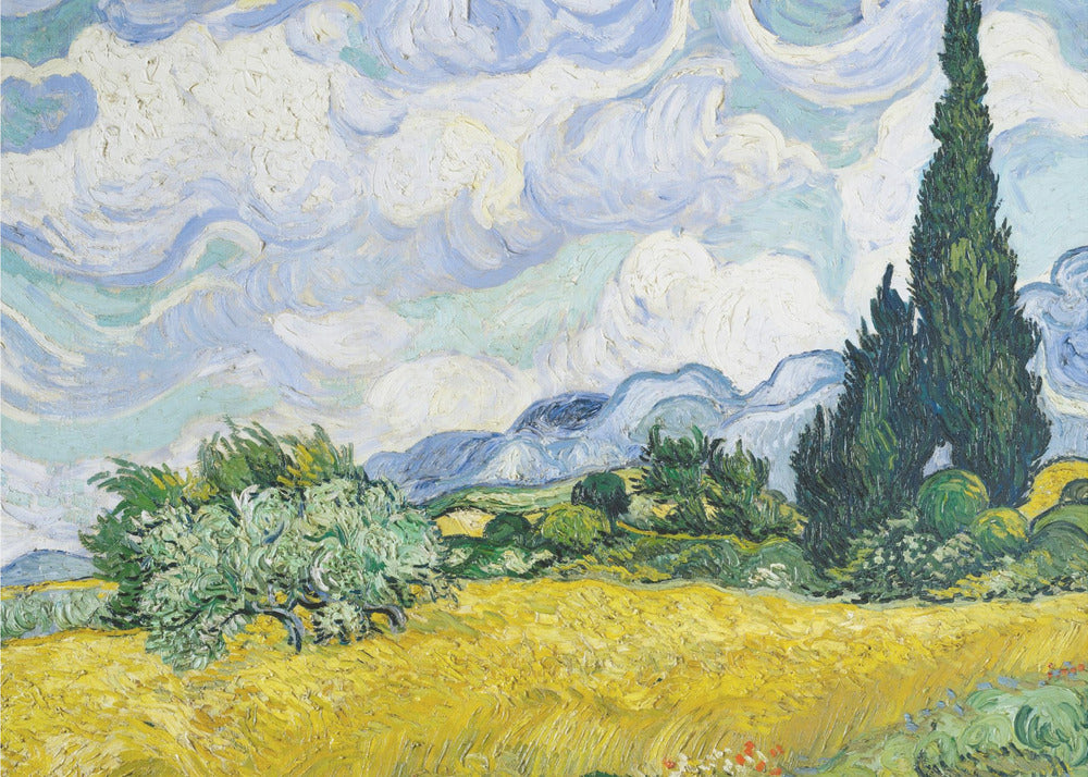 A framed print of Vincent van Gogh's painting 'Wheat Field with Cypresses.' The artwork depicts a vibrant golden wheat field under a dynamic sky filled with swirling white and blue clouds. A tall, dark green cypress tree dominates the right side, with rolling green hills and distant blue mountains in the background. Decor