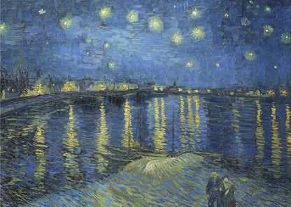 A framed print of Vincent van Gogh's painting, 'Starry Night Over the Rhône'. The artwork features a deep blue night sky filled with glowing yellow stars above a city skyline. The city lights and stars cast long, shimmering yellow reflections on the dark blue water of the river. In the foreground, two small figures of a couple are seen walking along the riverbank. Artwork