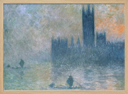 An Impressionist painting in a silver frame depicting the silhouette of the Houses of Parliament in London through a thick blue and grey fog, with the faint orange glow of a sun in the sky and small boats on the River Thames. Wall Art