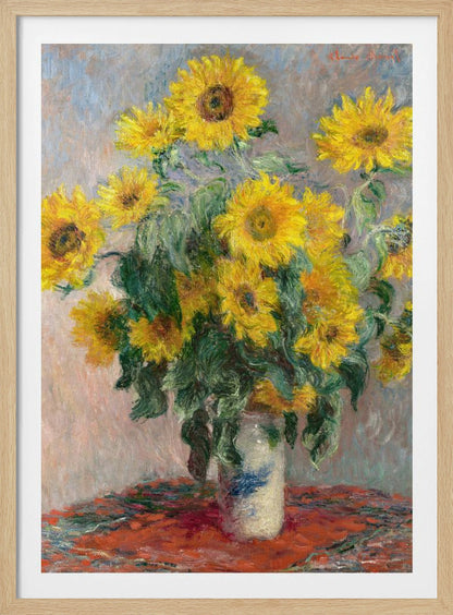 An Impressionist painting by Claude Monet titled 'Bouquet of Sunflowers'. The artwork features a vibrant bouquet of yellow sunflowers in a white and blue patterned vase, set upon a red tablecloth against a muted, textured blue-grey background. The piece is characterized by thick, visible brushstrokes and is displayed in a simple black frame. Poster