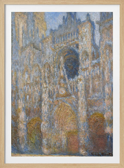 An impressionist painting depicting the facade of a grand cathedral. The artwork is characterized by its textured brushstrokes and a muted color palette of blues, golds, and tans, capturing the interplay of light and shadow on the stone architecture. The painting is set within a simple black frame. Artwork