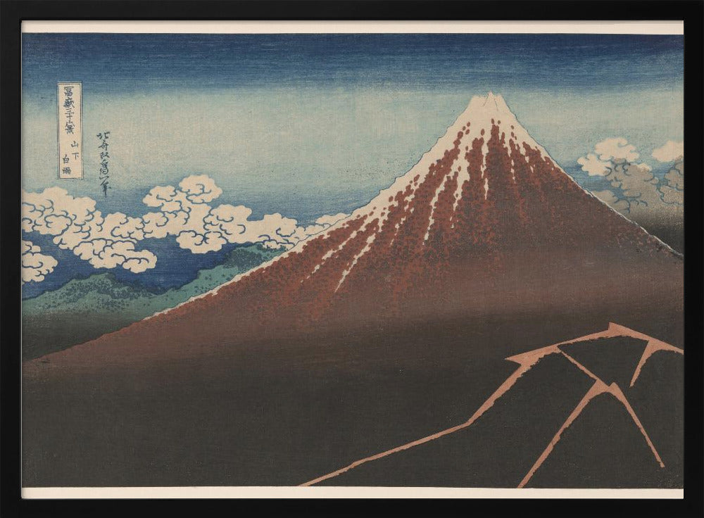 A classic Japanese ukiyo-e woodblock print by Hokusai, 'Thunderstorm Beneath the Summit', depicting a reddish-brown Mount Fuji with its snowy peak against a blue sky. Stylized clouds gather below the summit, and a fork of lightning illuminates the dark landscape at the mountain's base. Print
