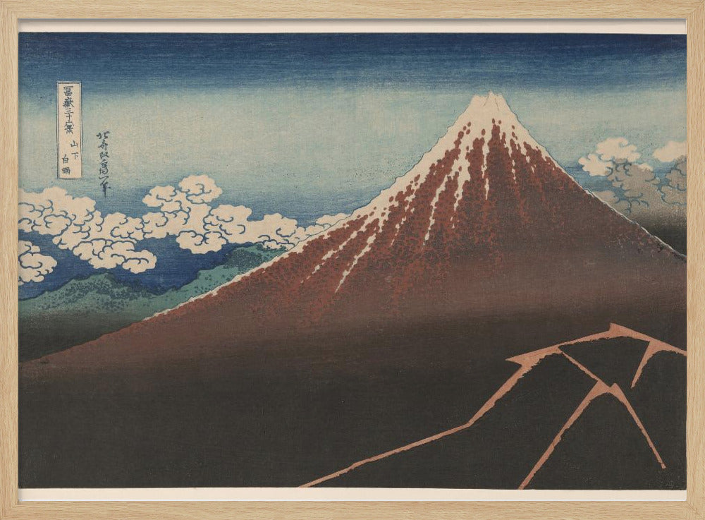 A classic Japanese ukiyo-e woodblock print by Hokusai, 'Thunderstorm Beneath the Summit', depicting a reddish-brown Mount Fuji with its snowy peak against a blue sky. Stylized clouds gather below the summit, and a fork of lightning illuminates the dark landscape at the mountain's base. Print