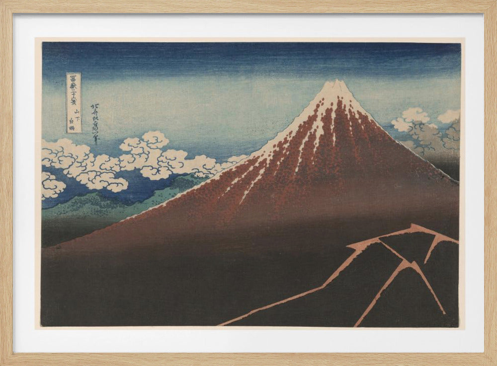 A classic Japanese ukiyo-e woodblock print by Hokusai, 'Thunderstorm Beneath the Summit', depicting a reddish-brown Mount Fuji with its snowy peak against a blue sky. Stylized clouds gather below the summit, and a fork of lightning illuminates the dark landscape at the mountain's base. Print