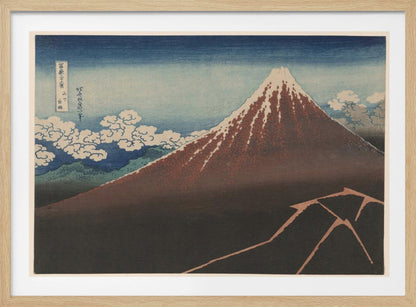 A classic Japanese ukiyo-e woodblock print by Hokusai, 'Thunderstorm Beneath the Summit', depicting a reddish-brown Mount Fuji with its snowy peak against a blue sky. Stylized clouds gather below the summit, and a fork of lightning illuminates the dark landscape at the mountain's base. Print