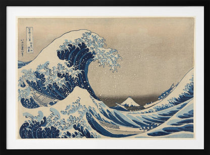 The Great Wave off Kanagawa by Hokusai, a famous Japanese ukiyo-e woodblock print. It depicts a massive, deep blue wave with claw-like white foam cresting and about to crash over three boats, with a small, snow-capped Mount Fuji visible in the background under a pale, graded sky. Artwork