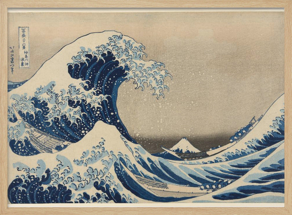 The Great Wave off Kanagawa by Hokusai, a famous Japanese ukiyo-e woodblock print. It depicts a massive, deep blue wave with claw-like white foam cresting and about to crash over three boats, with a small, snow-capped Mount Fuji visible in the background under a pale, graded sky. Artwork