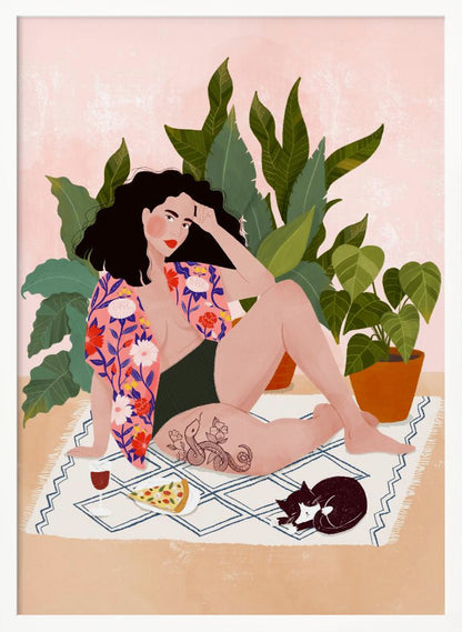 An illustration of a woman with dark curly hair relaxing on a patterned blanket indoors. She is wearing a green swimsuit and a pink floral shirt, with a prominent snake tattoo on her thigh. Next to her is a slice of pizza, a glass of red wine, and a sleeping black and white cat, all set against a backdrop of large green houseplants and a pink wall. Artwork