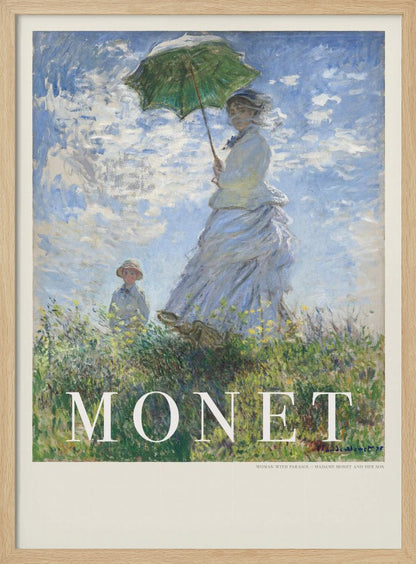 A vintage art poster of Claude Monet's impressionist painting, 'Woman with a Parasol - Madame Monet and Her Son.' It depicts a woman in a white dress holding a green parasol on a grassy hill against a blue, cloud-filled sky, with her son visible in the background. The text 'MONET' is prominently displayed at the bottom. Wall Art