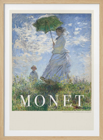 A vintage art poster of Claude Monet's impressionist painting, 'Woman with a Parasol - Madame Monet and Her Son.' It depicts a woman in a white dress holding a green parasol on a grassy hill against a blue, cloud-filled sky, with her son visible in the background. The text 'MONET' is prominently displayed at the bottom. Wall Art