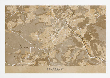 A framed, stylized map of Stuttgart, Germany, in shades of brown and beige. Major roads and waterways are highlighted in a contrasting cream color, creating a detailed and modern look. The city name 'STUTTGART' is written at the bottom. The entire map is enclosed in a simple silver-colored frame. Poster