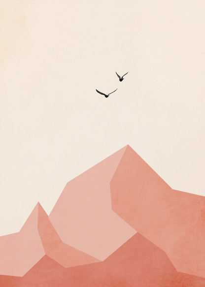 A minimalist framed artwork featuring geometric, faceted mountains in shades of pink and coral against a light cream sky. Two small black birds are shown flying above the peaks, creating a serene and modern nature scene. Wall Art