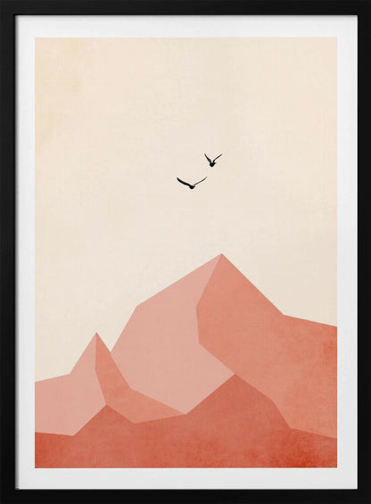 A minimalist framed artwork featuring geometric, faceted mountains in shades of pink and coral against a light cream sky. Two small black birds are shown flying above the peaks, creating a serene and modern nature scene. Wall Art