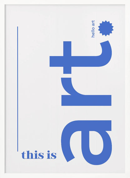 A minimalist art print in a black frame, featuring a white background with blue text. The word 'art' is written vertically in a large, bold lowercase font. To the left, smaller text reads 'this is'. At the top right, 'hello art' is written next to a blue starburst graphic. Wall Art