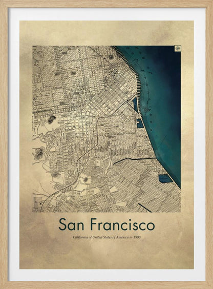 A framed vintage map of San Francisco from 1900. The map is detailed on aged, beige paper, with the bay depicted in a deep teal blue. Below the map, text reads 'San Francisco' and 'California of United States of America in 1900'. Artwork