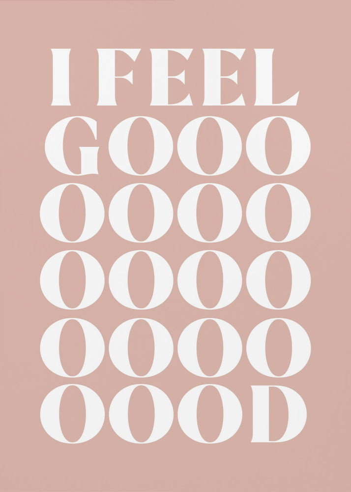 A framed typographic poster featuring the words 'I FEEL GOOOOOD' in a large, white serif font against a dusty pink background. The word 'GOOD' is stylized and stretched vertically with multiple rows of the letter 'O'. Artwork