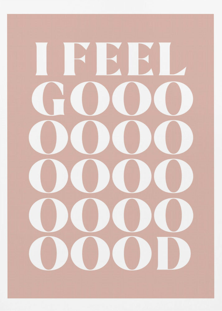 A framed typographic poster featuring the words 'I FEEL GOOOOOD' in a large, white serif font against a dusty pink background. The word 'GOOD' is stylized and stretched vertically with multiple rows of the letter 'O'. Artwork
