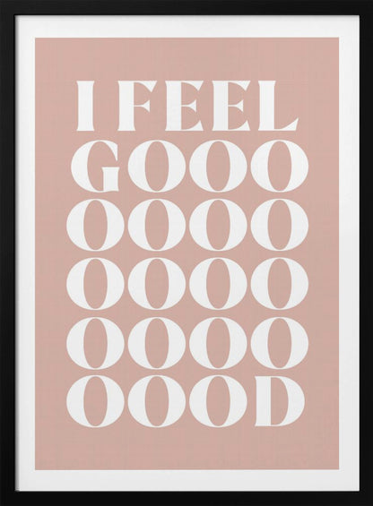 A framed typographic poster featuring the words 'I FEEL GOOOOOD' in a large, white serif font against a dusty pink background. The word 'GOOD' is stylized and stretched vertically with multiple rows of the letter 'O'. Artwork