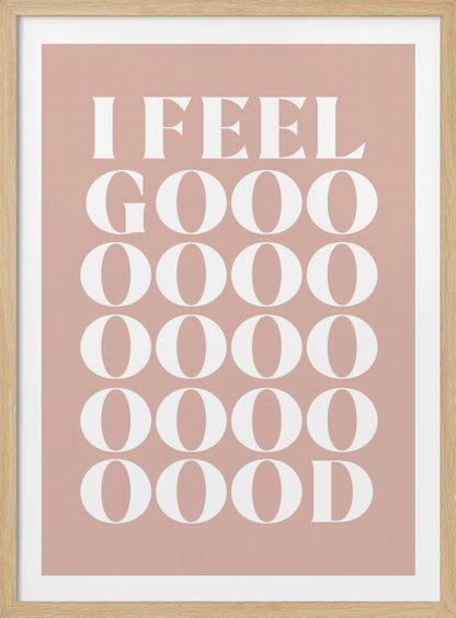 A framed typographic poster featuring the words 'I FEEL GOOOOOD' in a large, white serif font against a dusty pink background. The word 'GOOD' is stylized and stretched vertically with multiple rows of the letter 'O'. Artwork