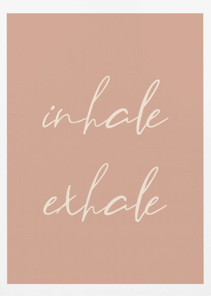A minimalist framed poster featuring the words 'inhale' and 'exhale' in a flowing white script font, stacked vertically against a solid dusty pink background. Poster