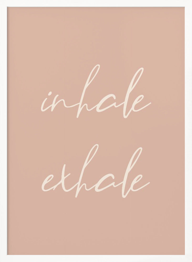 A minimalist framed poster featuring the words 'inhale' and 'exhale' in a flowing white script font, stacked vertically against a solid dusty pink background. Poster