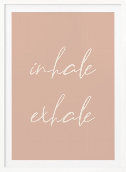 A minimalist framed poster featuring the words 'inhale' and 'exhale' in a flowing white script font, stacked vertically against a solid dusty pink background. Poster