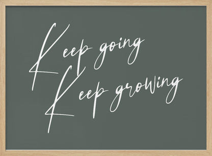 A motivational art piece featuring the words 'Keep going' and 'Keep growing' in a delicate white script on a muted sage green background, set within a simple silver frame. Print