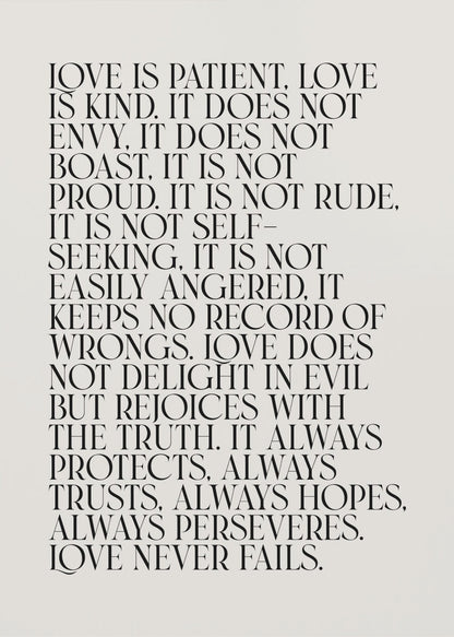 A minimalist art print featuring the 'Love is patient, love is kind...' bible verse from 1 Corinthians 13. The text is printed in a black, all-caps serif font on an off-white background and is surrounded by a simple black frame. Print