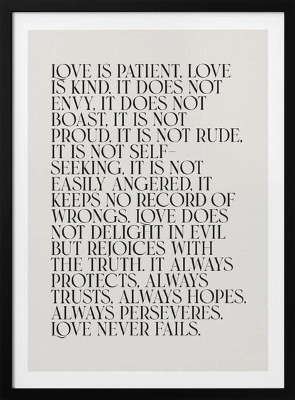 A minimalist art print featuring the 'Love is patient, love is kind...' bible verse from 1 Corinthians 13. The text is printed in a black, all-caps serif font on an off-white background and is surrounded by a simple black frame. Print