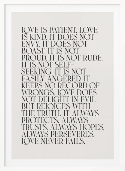 A minimalist art print featuring the 'Love is patient, love is kind...' bible verse from 1 Corinthians 13. The text is printed in a black, all-caps serif font on an off-white background and is surrounded by a simple black frame. Print
