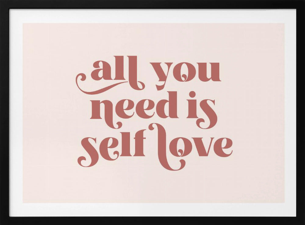 A framed art print with the phrase 'all you need is self love' in a stylish, dusty rose serif font on a light pink background. The artwork is enclosed in a simple silver frame. Poster