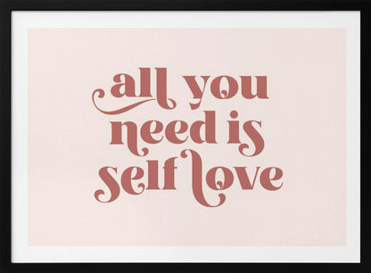 A framed art print with the phrase 'all you need is self love' in a stylish, dusty rose serif font on a light pink background. The artwork is enclosed in a simple silver frame. Poster
