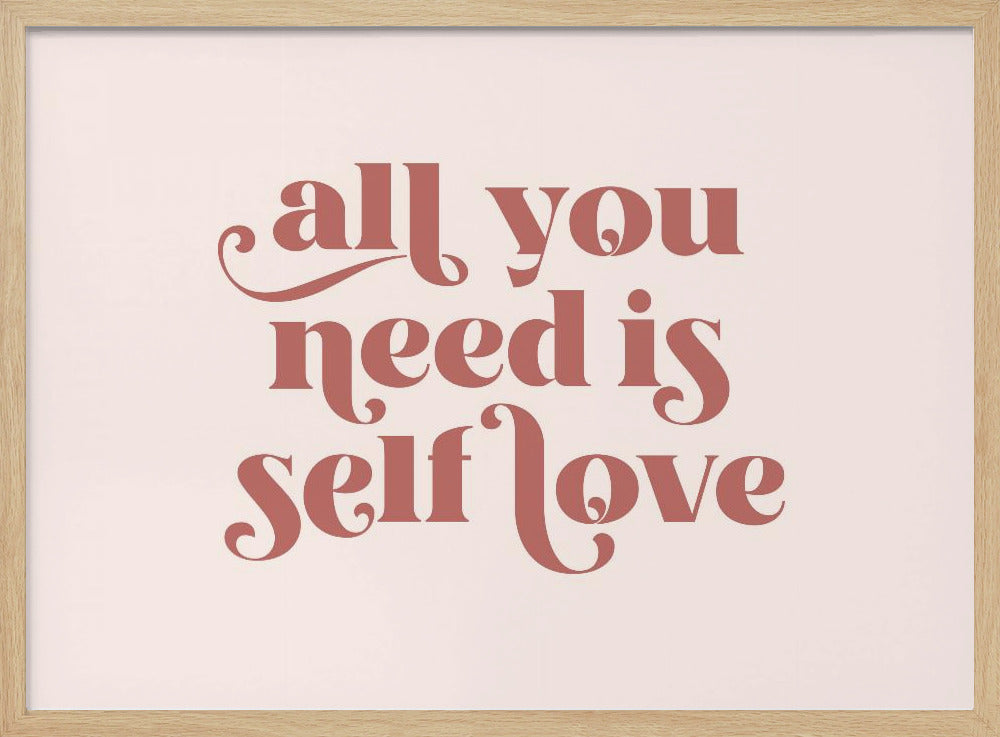 A framed art print with the phrase 'all you need is self love' in a stylish, dusty rose serif font on a light pink background. The artwork is enclosed in a simple silver frame. Poster