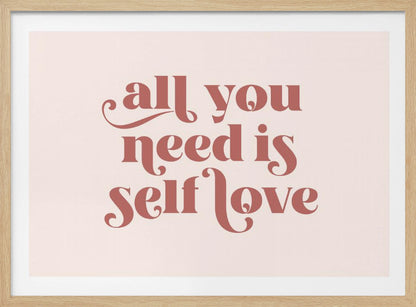 A framed art print with the phrase 'all you need is self love' in a stylish, dusty rose serif font on a light pink background. The artwork is enclosed in a simple silver frame. Poster
